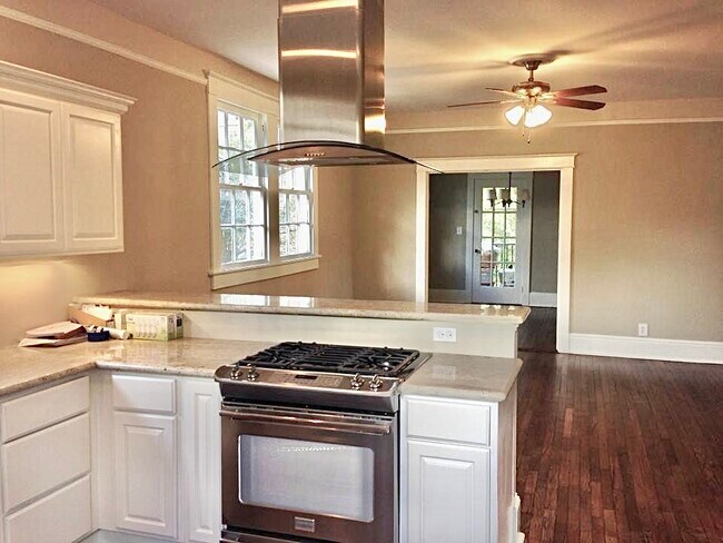 Kitchen to living to dining to screened porch - 1217 Foucher St Unit 1217