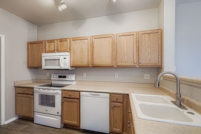 Photo - Move in Ready- Ground floor condo in covered Lodge at Terralago. Swimming Pool- Hot Tub and Fitne...