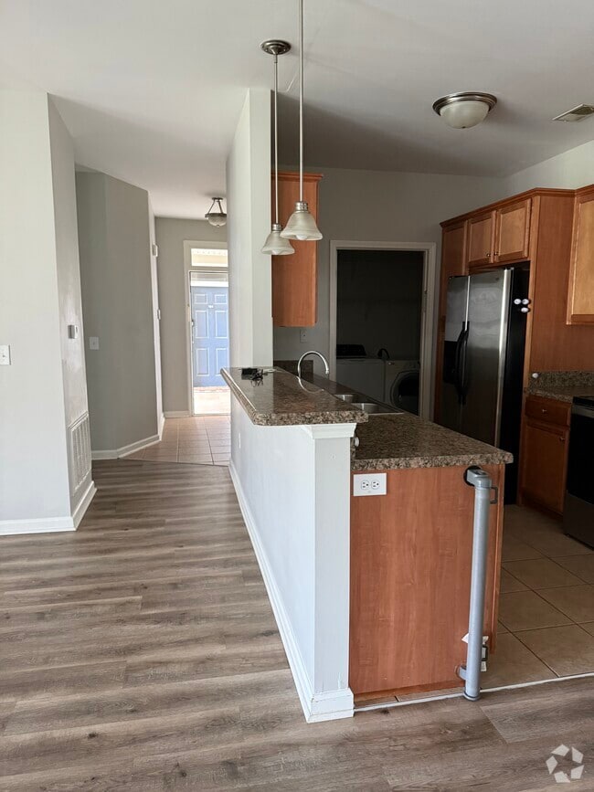 Building Photo - 2641 McArthur Landing Cir Unit 102 Rental