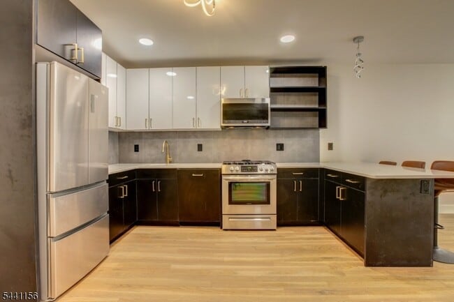 Building Photo - 623 38th St Unit 2