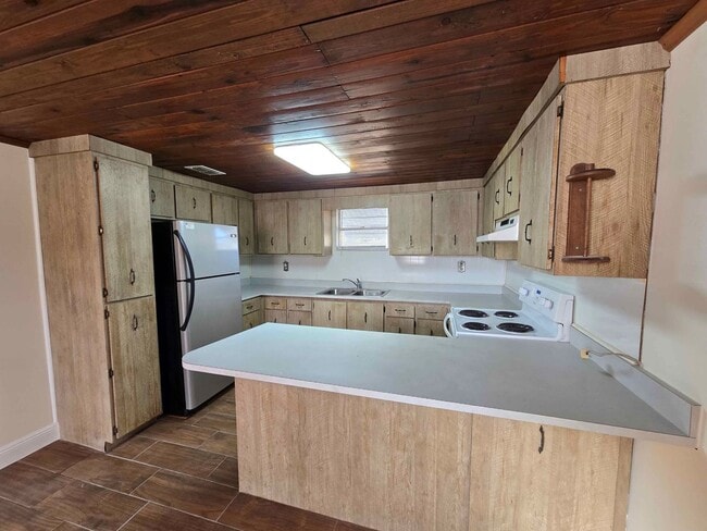 Photo - Two Bedroom Home with Large Fenced-in Yard