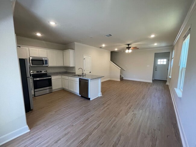 Photo - MOVE FAST—GATED TOWNHOME NEAR LACKLAND AFB WITH A PRIVATE YARD!
