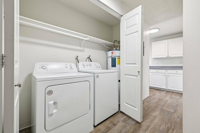 Enjoy convenient in-unit laundry with modern washer and dryer appliances at Foster Creek Apartments in Tukwila, WA.