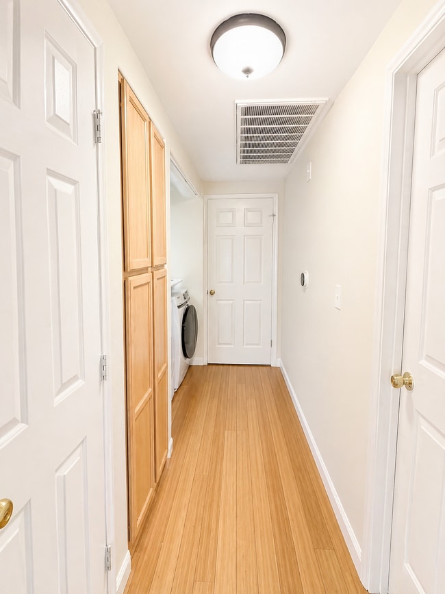Hallway and laundry nook - 9580 W Reno Ave Unit 239