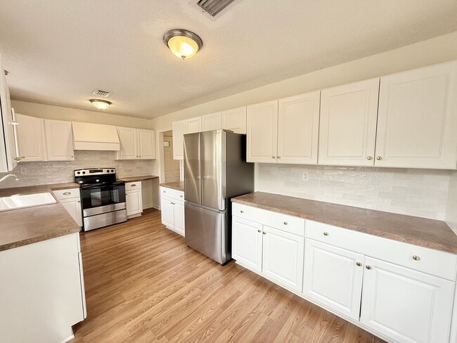 Photo - Spacious 3-Bed/2-Bath With Large Backyard