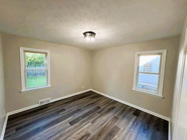 Photo - 4-Bedroom Home with Finished Basement & Mo...