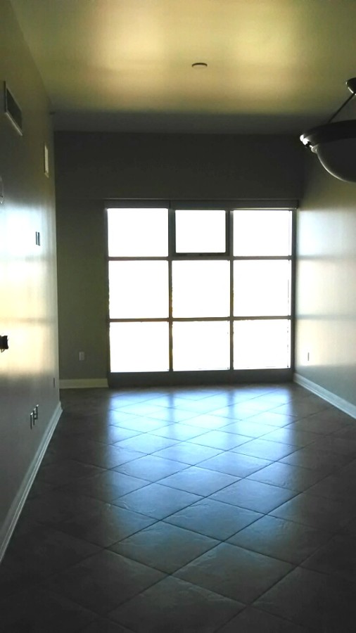 Main Living Area with balcony on left - 150 S Las Vegas Blvd Condo