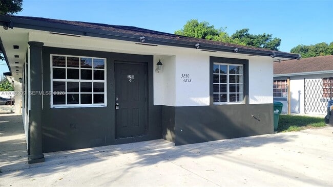 Building Photo - 3250 NW 94th St Unit 0
