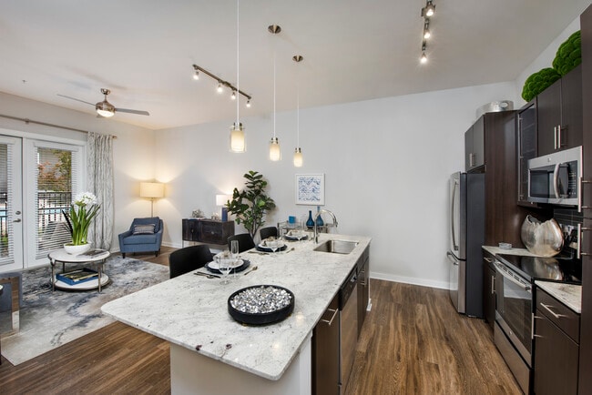 Open Concept Kitchen & Living Room - Overture Buckhead South 55+ Apartment Homes