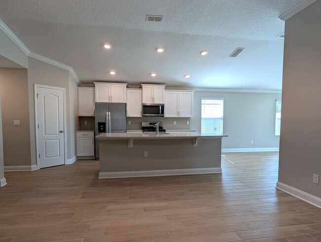 Photo - PREMIUM PRICE, PREMIUM FINISHES AND FULLY FENCED REAR YARD - THIS 3/2/2 IN THE DESIRABLE GATED DO...