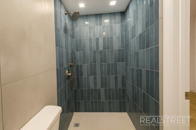 Photo - Spacious 2-Bedroom, 2-Bath Apartment in Bed-Stuy with Modern Amenities