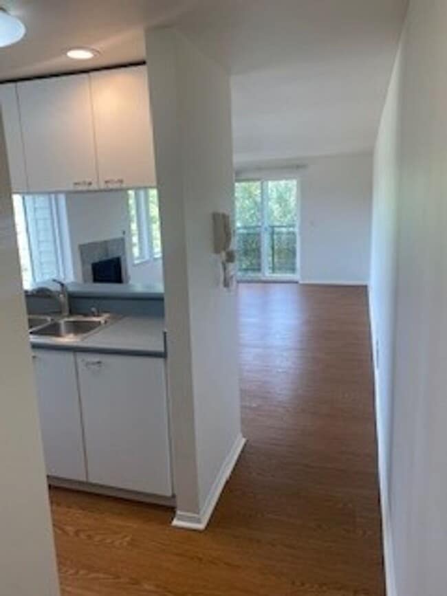 Photo - Queen Anne west facing 1 Bedroom patio secure building and garage Unit 201