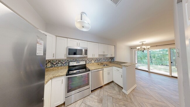 Photo - Spacious and Updated 1 bed + 1 BA Condo - walk out level