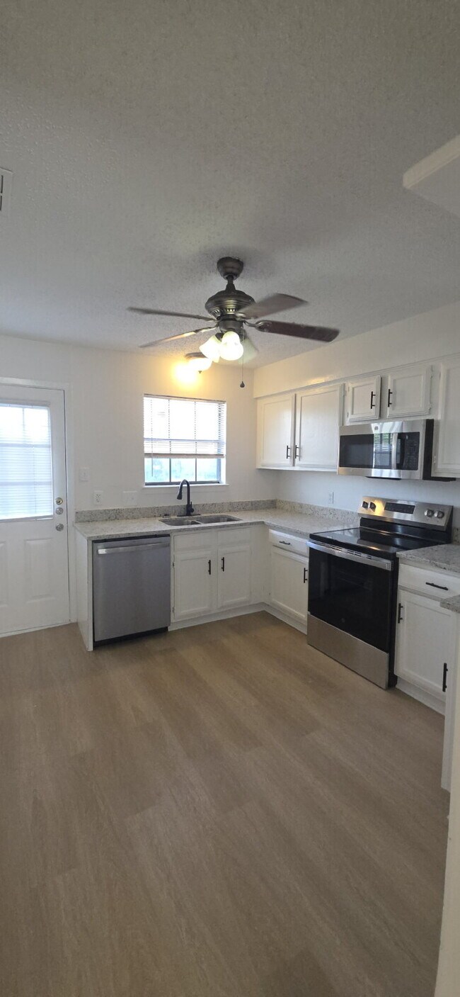 Photo - First-floor condo with fenced in backyard!