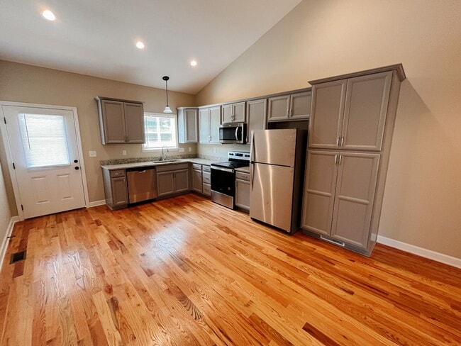 Photo - 3 Bed, 2 Bath New Construction Townhome with Granite & Hardwoods