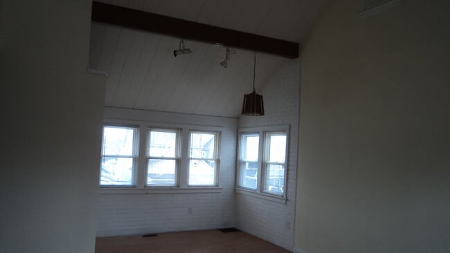 14 foot ceiling - 117 E Suttenfield St Apartments Unit 2