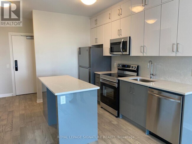 Photo - 95 Dundas St W Unité 112