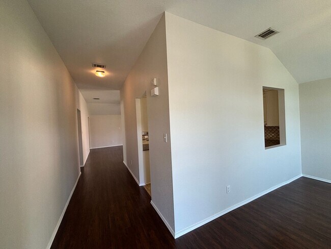 Photo - 4 BR/2BA | Updated Single Family Home | 2-Car Garage Parking | Fenced backyard