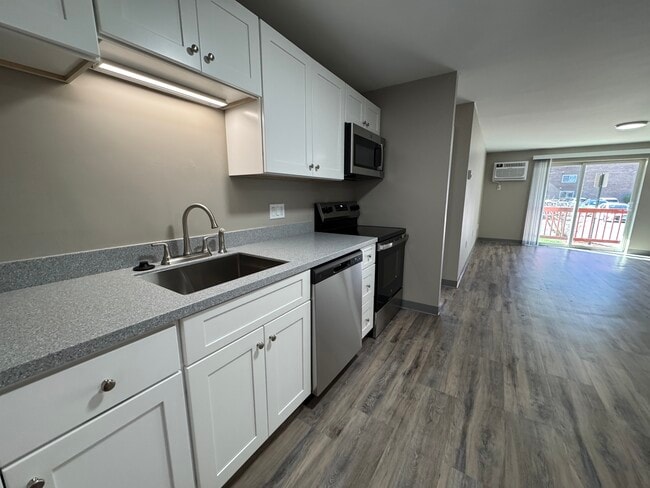 Soft close cabinetry - Milford Trails Apartments and Storage