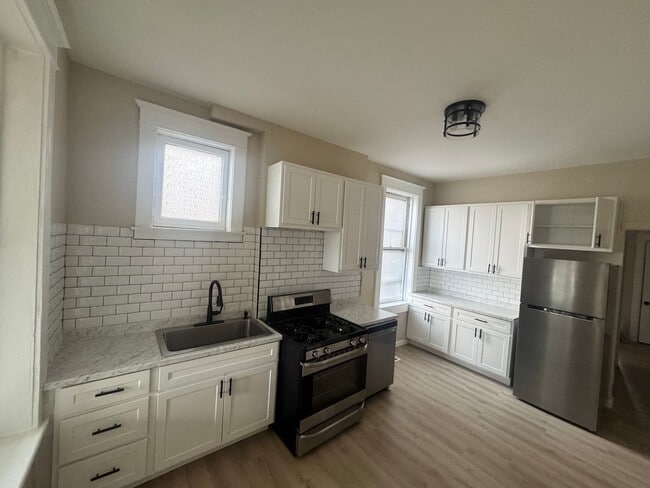 Building Photo - 6109 Virginia Ave Unit 1G