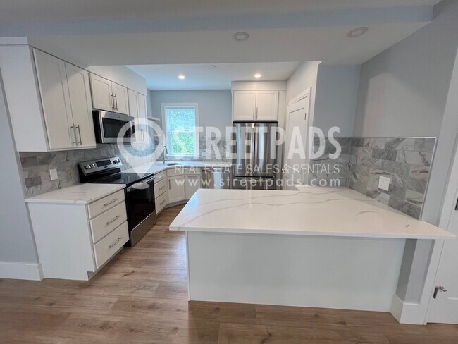 Building Photo - 11 Holton St Unit 1