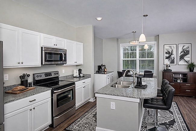 Aspen Lakes Apartments Open Concept Kitchen with Island - Aspen Lakes