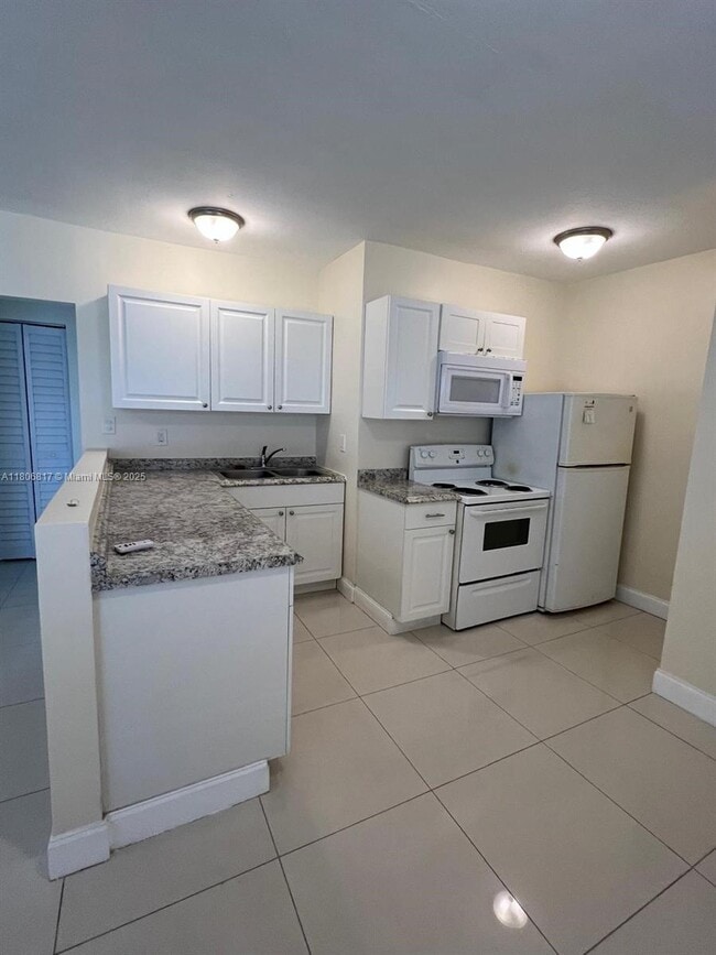 Photo - 1992 NE 172nd St Apartment Unit 1