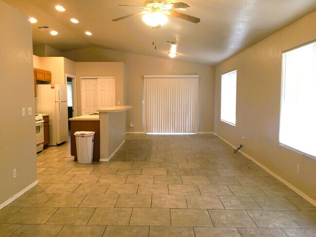 Photo - 3-Bedroom Single Family Home with Central Cooling, Attached Garage, and Tile Flooring