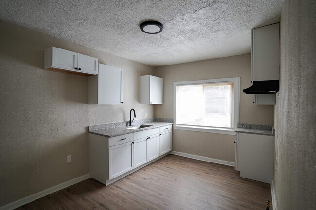 Photo - This beautifully updated 3-bedroom, 1-bath...