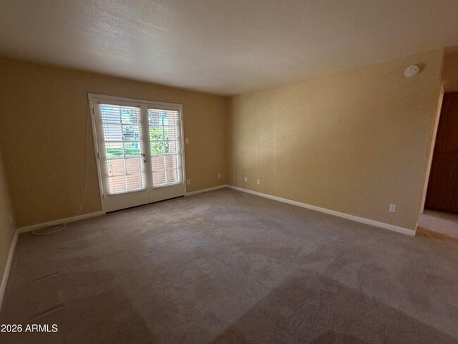 Building Photo - 5995 N 78th St Unit 1009