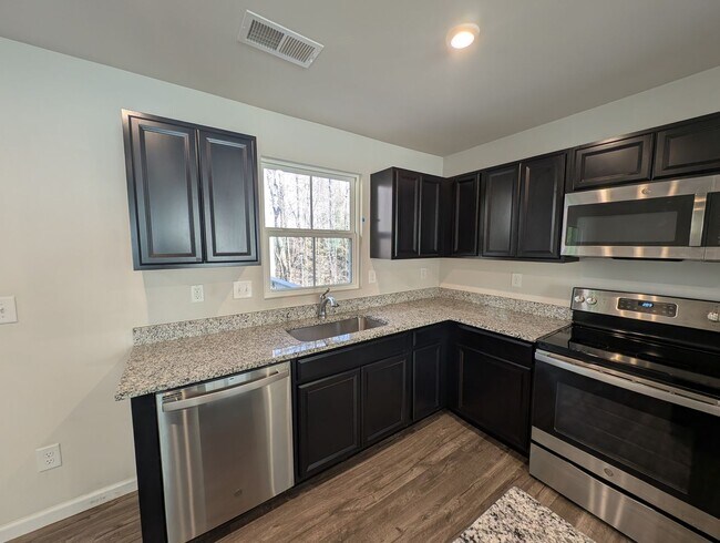 Photo - Pristine Townhome located in the North End Commons Community!