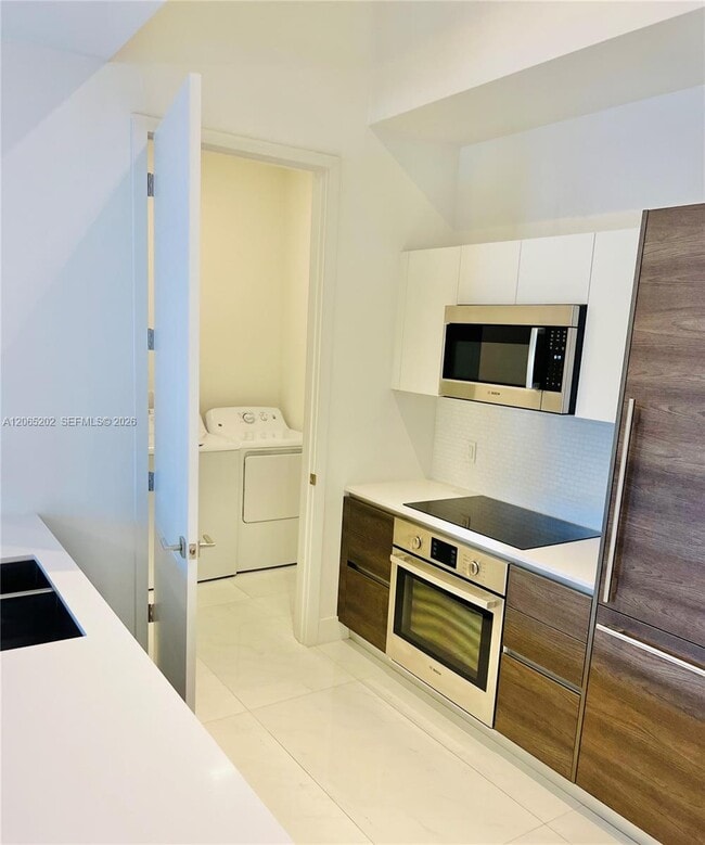 Building Photo - 301 Altara Ave Unit 210