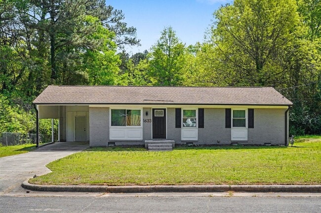 Building Photo - Updated 3 Bedroom Home Convenient to Downtown Raleigh