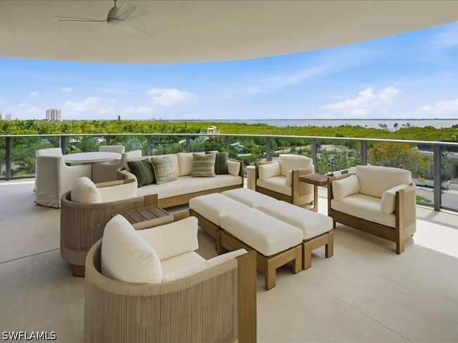 Building Photo - 5100 Seagrass Blvd Unit 306