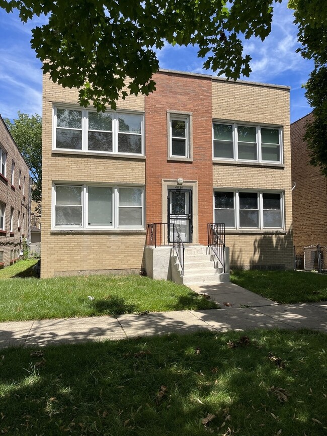 Building Photo - 4934 Mulford St Unit 2W