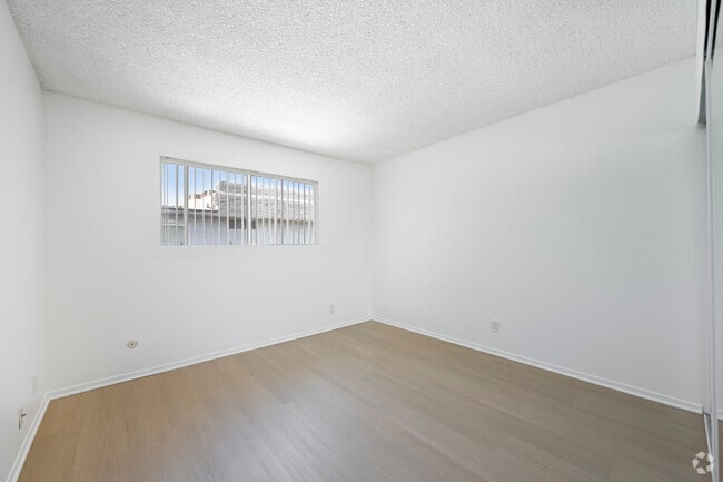 2BR, 2BA - 1200SF - Primary Bedroom - Mountain View Manor Apartments