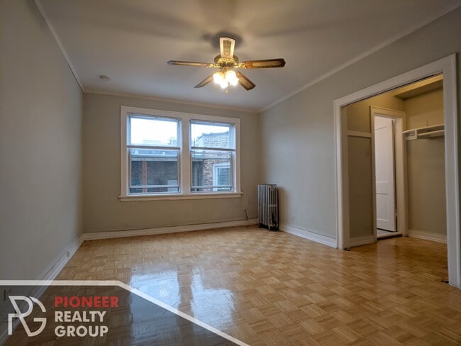 Building Photo - 711 W Belmont Ave Unit 511
