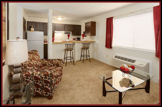 Living Room & Kitchen - Huntington Place Apartments