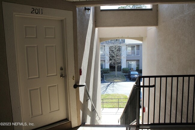 Building Photo - 7920 Merrill Rd Unit 2011