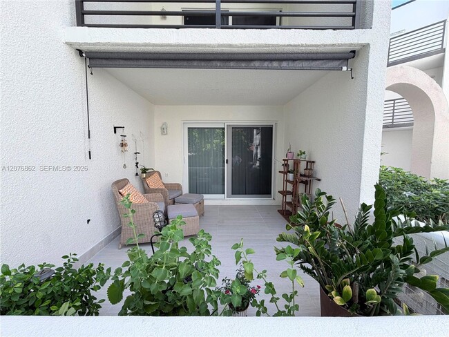 Building Photo - 9731 Fontainebleau Blvd Unit F108