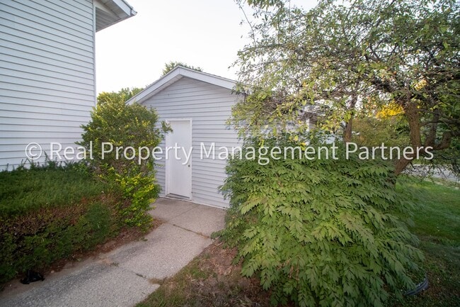 Photo - 2-Bed, 1-Bath Upper Unit with Garage & Porch – Steps from Paul Henry Trail