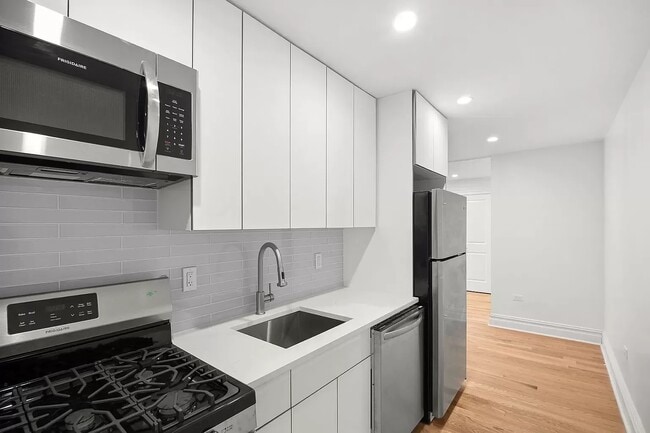 Photo - 97-25 64th Ave