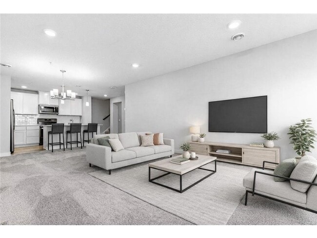 Photo - Spacious 3BR Townhome with Loft & Attached 2-Car Garage - Available NOW!