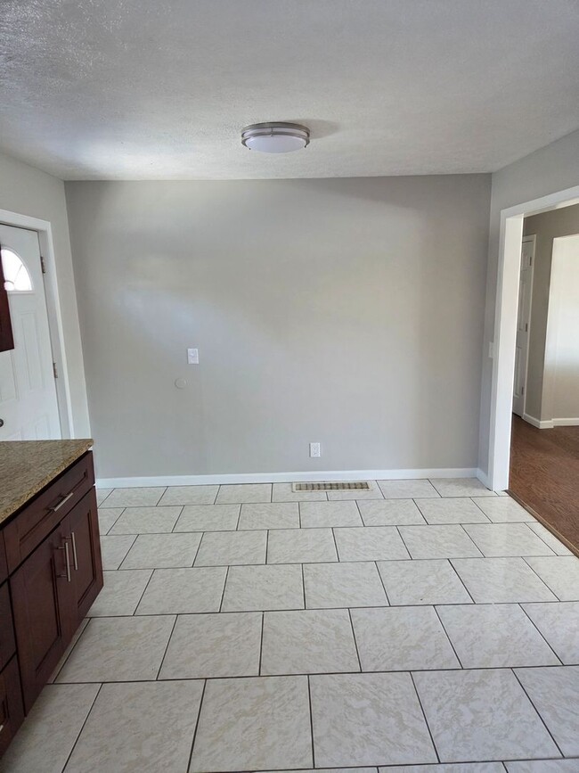 Photo - 4 bed 2.5 bath with a 2 car garage and fenced backyard