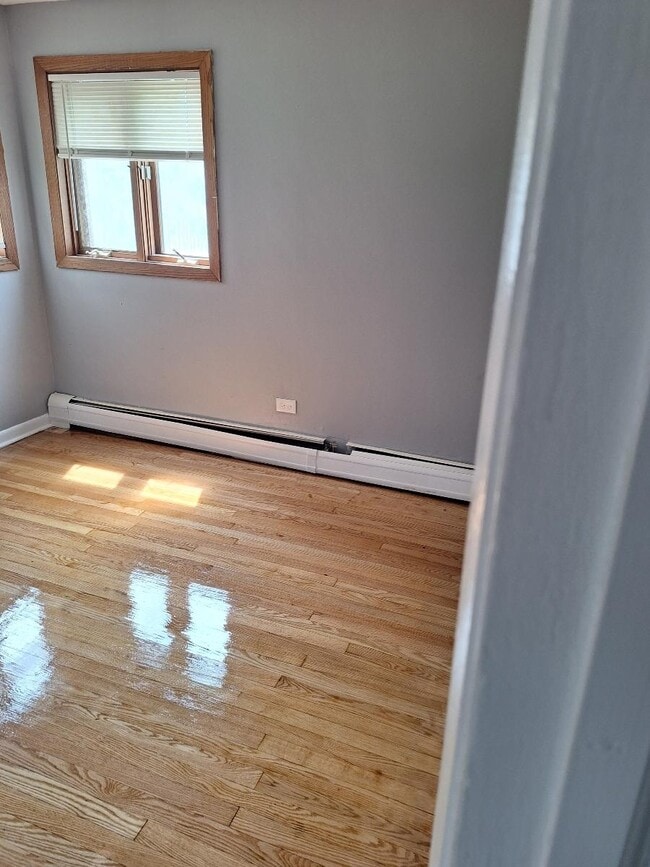 Building Photo - 14047 S Tracy Ave Unit 1B