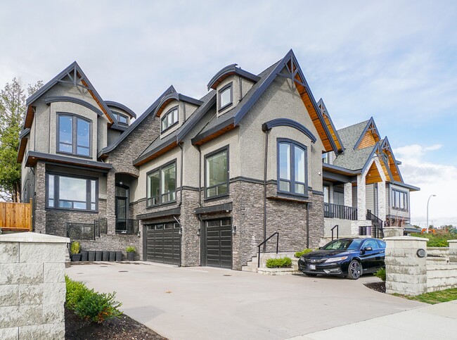 Building Photo - 5483-5188 188 St Unit 1