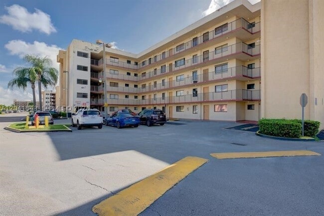 Building Photo - 9915 W Okeechobee Rd Unit 2-404