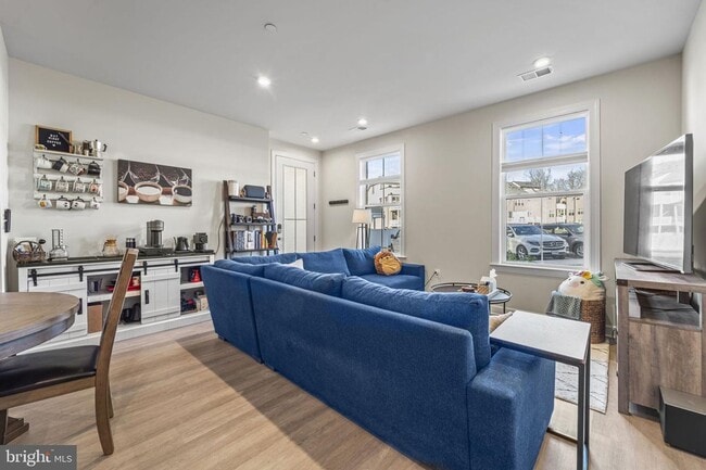 Photo - This beautiful 3 bed 2.5 bath 2-story condo provides a grand feeling with tall ceilings & over 16...