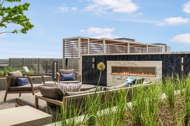 Gather, unwind, and enjoy fireside city views. - One Oak Brook Commons
