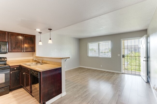 Building Photo - HOUSING CHOICE VOUCHER APPROVED! Charming 2-Bedroom Upstairs Unit with Modern Finishes & Everyday...